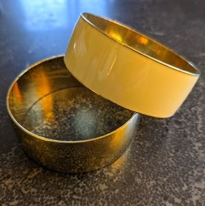 2 J. Crew gold and cream bangles